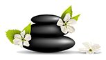 3 smooth black stones stacked and 3 little white flowers